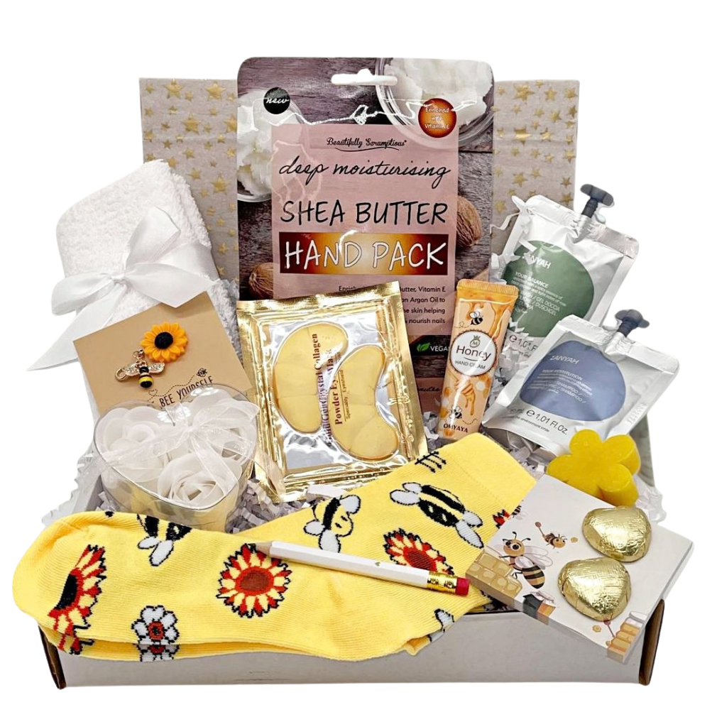 SUNFLOWER AND BEE self care gift box for lady, contains lovely treats including hand treatment mask, handcream, body wash, shampoo, honeysuckle flower soap, cotton face towelbee notepad, pencil with rubber, rose peal soap, belgian chocolate hearts,  eye soothers, all packed in to a box with tissueand card of your choice.