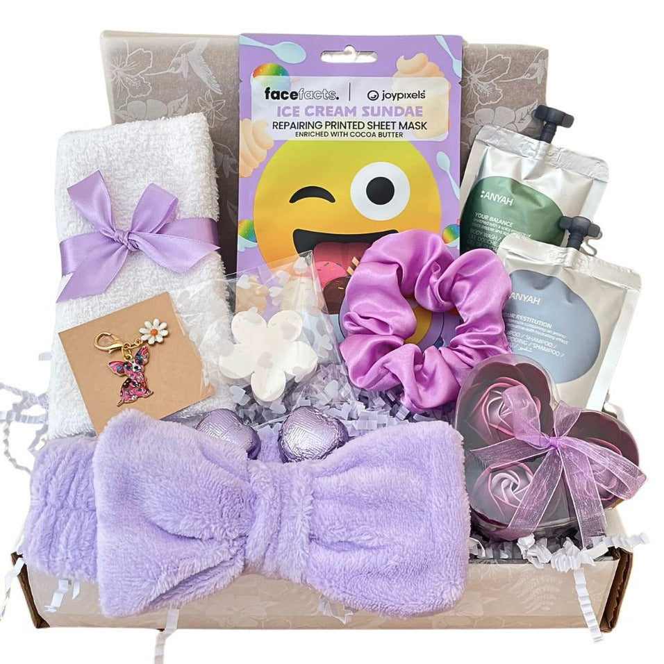 Teenage girl self care gift box, ideal for a birthday or christmas or after exam stress. The box contains face mask, face towel, body wash, shampoo, hair scrunchie, rose petal soap leaves, bath/shower hairband, flower soap, do keyring and chocolate hearts, packed in to a box with pretty tissue and gift card of your choice. 
